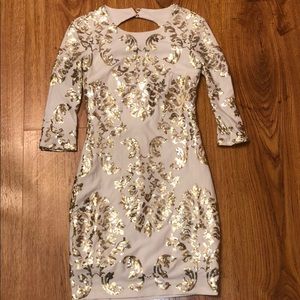White and gold sequin dress